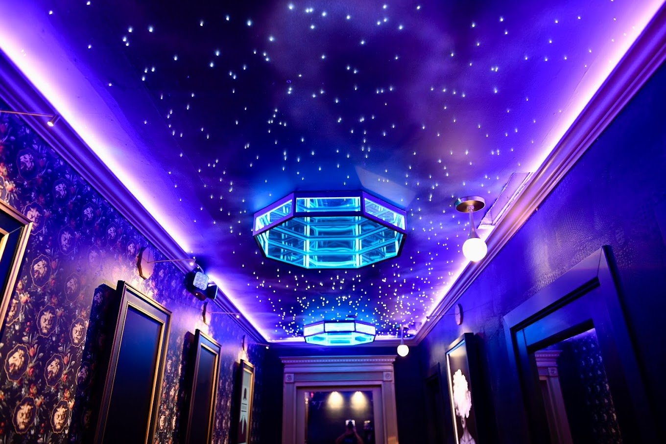 blue and purple ceiling lights with stars